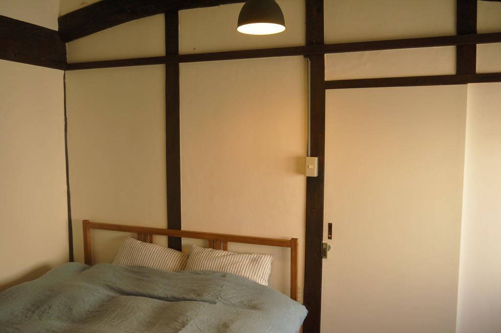 Minatoya Guesthouse Iki Habitación foto